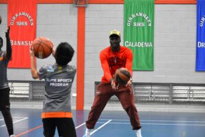 Read more about the article NBA Player, Duop Reath, returns to Girrawheen SHS